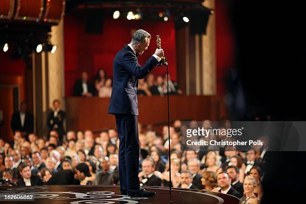 Actor Daniel Day-Lewis accepts the Best Actor award for "Lincoln," seen from backstage during the Oscars held at the Dolby Theatre on February 24,...