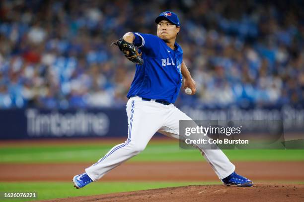 Hyun Jin Ryu of the Toronto Blue Jays pitches in the first inning of their MLB game against the Cleveland Guardians at Rogers Centre on August 26,...