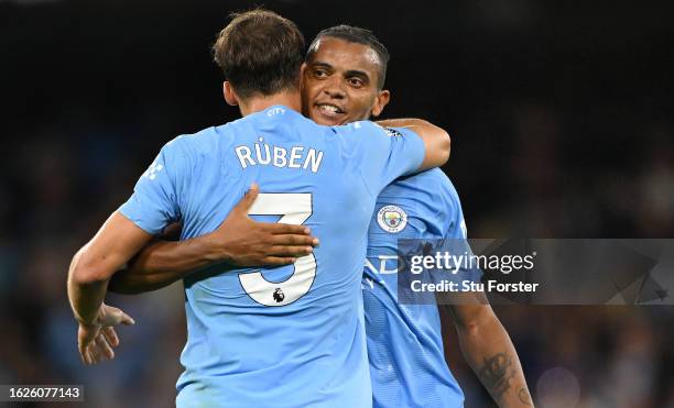 Manchester City players Ruben Dias and Manuel Akanji celebrates after the Premier League match between Manchester City and Newcastle United at Etihad...