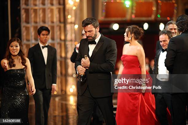 Actor-producer-director Ben Affleck walks off stage after winning of the Best Picture award for 'Argo', during the Oscars held at the Dolby Theatre...