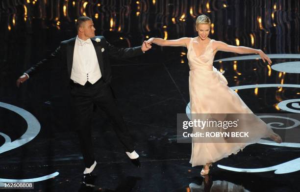 Actors Charlize Theron and Channing Tatum perform onstage at the show of the 85th Annual Academy Awards on February 24, 2013 in Hollywood,...