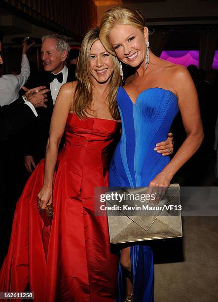 Jennifer Aniston and Nancy O'Dell attend the 2013 Vanity Fair Oscar Party hosted by Graydon Carter at Sunset Tower on February 24, 2013 in West...