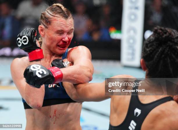 Natalia Silva of Brazil punches Andrea Lee in a flyweight fight during the UFC 292 event at TD Garden on August 19, 2023 in Boston, Massachusetts.