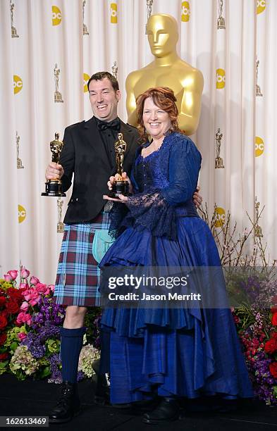 Directors Mark Andrews and Brenda Chapman, winners of the Best Animated Feature award for 'Brave,' pose in the press room during the Oscars held at...