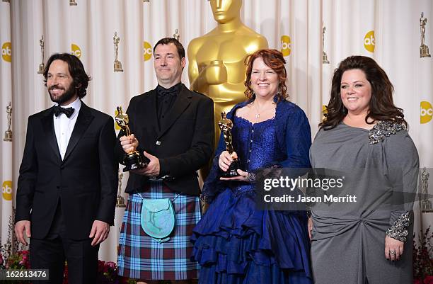 Directors Mark Andrews and Brenda Chapman , winners of the Best Animated Feature award for "Brave," with presenters Paul Rudd and Melissa McCarthy ,...