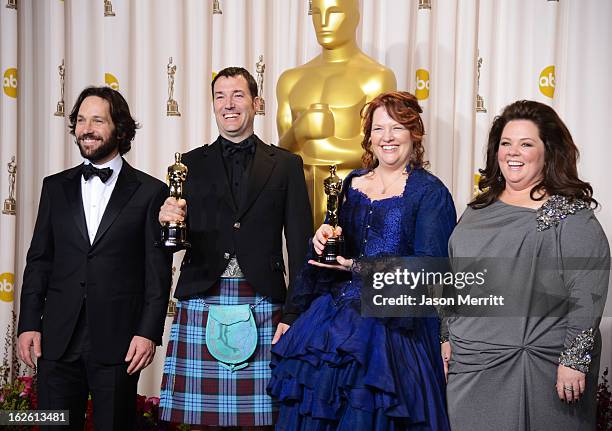 Directors Mark Andrews and Brenda Chapman , winners of the Best Animated Feature award for "Brave," with presenters Paul Rudd and Melissa McCarthy ,...