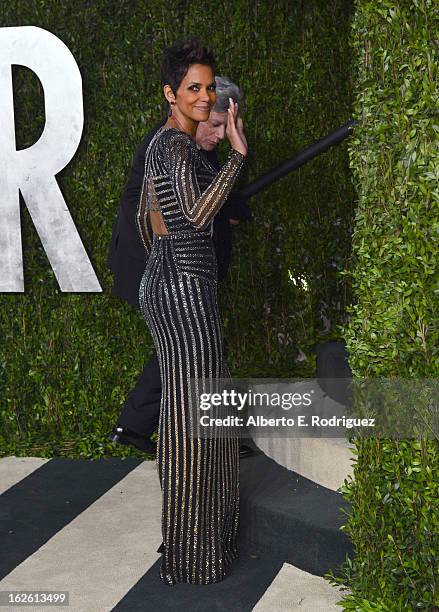 Actress Halle Berry arrives at the 2013 Vanity Fair Oscar Party hosted by Graydon Carter at Sunset Tower on February 24, 2013 in West Hollywood,...