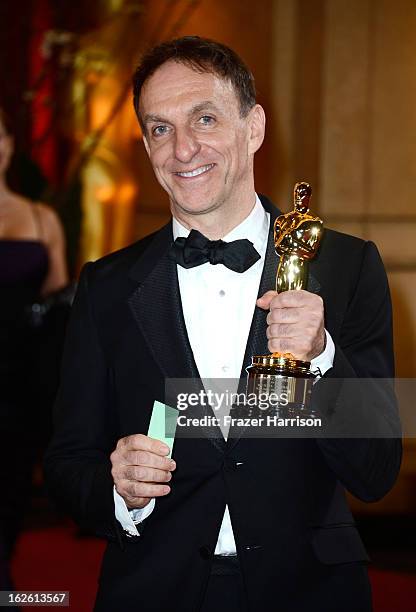 Composer Mychael Danna, winner of the Best Original Score award for 'Life of Pi,' departs the Oscars at Hollywood & Highland Center on February 24,...