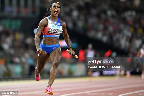 S Sha'Carri Richardson reacts as she crosses the finish line to win the women's 4x100m relay final during the World Athletics Championships at the...