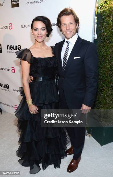 Actors Kerry Norton and Jamie Bamber attend the 21st Annual Elton John AIDS Foundation Academy Awards Viewing Party at West Hollywood Park on...