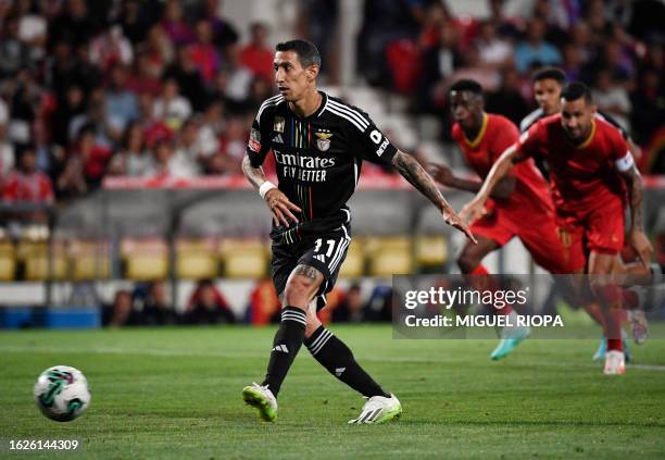 Benfica's Argentinian forward Angel Di Maria scores the opening goal from the penalty spot during the Portuguese league football match between Gil...