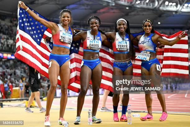 S Gabrielle Thomas, Tamari Davis, Twanisha Terry, and Sha'Carri Richardson pose for a photo after they won the women's 4x100m relay final during the...