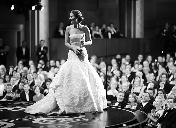 Actress Jennifer Lawrence accepts the award for Performance by an Actress in a Leading Role onstage during the Oscars held at the Dolby Theatre on...