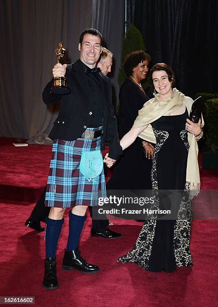 Director Mark Andrews, winner of the Best Animated Feature award for 'Brave,' and Patricia Andrews depart the Oscars at Hollywood & Highland Center...