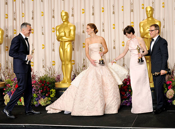 Jennifer Lawrence, Anne Hathaway, Daniel Day-Lewis and Christoph Waltz in the press room during the 85th Annual Academy Awards held at the Loews...