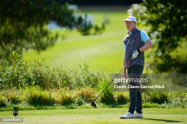 Team Great Britain and Ireland player Donnacha Cleary reacts after teeing off on the 17th hole on Day Two of the The Jacques Leglise Trophy at Golf...