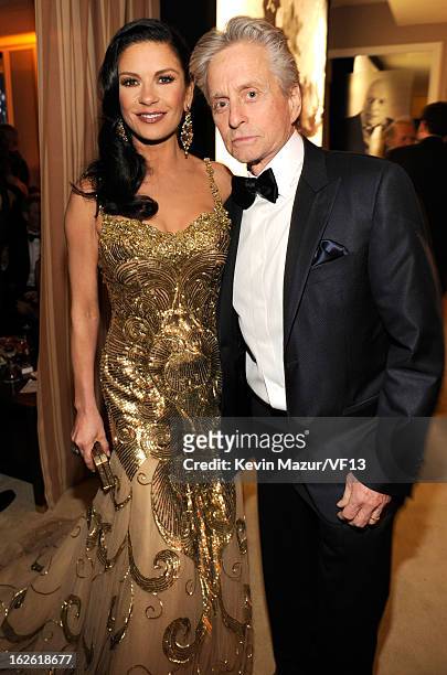 Catherine Zeta-Jones and Michael Douglas attend the 2013 Vanity Fair Oscar Party hosted by Graydon Carter at Sunset Tower on February 24, 2013 in...