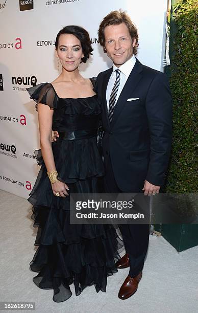 Actors Kerry Norton and Jamie Bamber attend the 21st Annual Elton John AIDS Foundation Academy Awards Viewing Party at West Hollywood Park on...