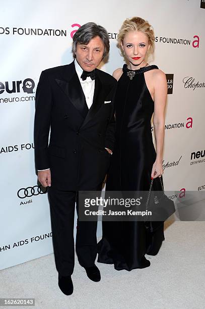 Fashion designer Leon Max and actress Madison Walls attend the 21st Annual Elton John AIDS Foundation Academy Awards Viewing Party at West Hollywood...