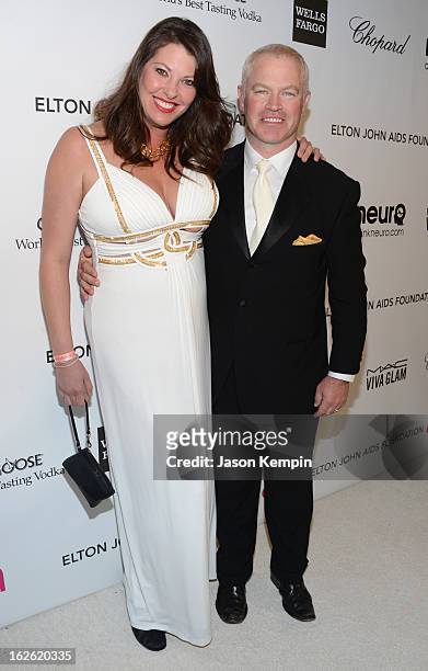 Actor Neal McDonough and Ruve McDonough attend the 21st Annual Elton John AIDS Foundation Academy Awards Viewing Party at West Hollywood Park on...
