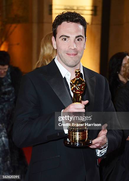 Sound mixer Mark Paterson, winner of the Best Sound Mixing award for 'Les Miserables' departs the Oscars at Hollywood & Highland Center on February...