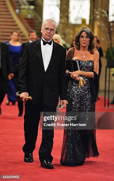 Visual Effects Artist Donald R. Elliott, winner of Best Visual Effects for 'Life of Pi', and guest depart the Oscars at Hollywood & Highland Center...