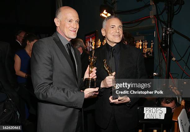 Oscar's Telecast Executive Producers Craig Zadan and Neil Meron pose with trophies backstage during the Oscars held at the Dolby Theatre on February...