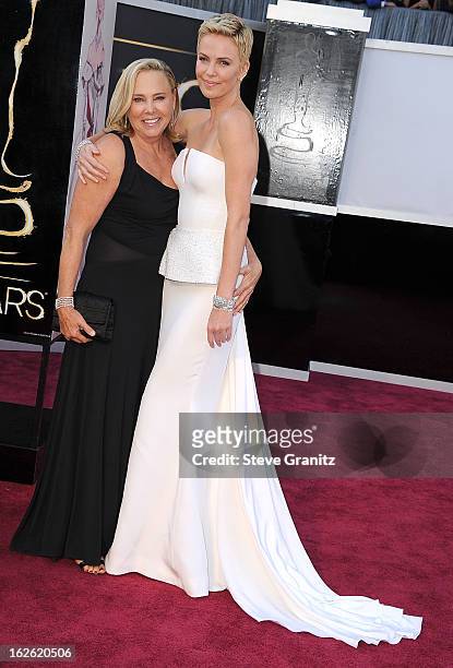 Charlize Theron and Gerda Jacoba Aletta Maritz arrives at the 85th Annual Academy Awards at Dolby Theatre on February 24, 2013 in Hollywood,...
