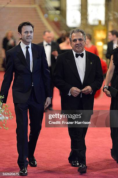 Co-Chairman & Chief Executive Officer of Fox Filmed Entertainment Jim Gianopulos and guest depart the Oscars at Hollywood & Highland Center on...