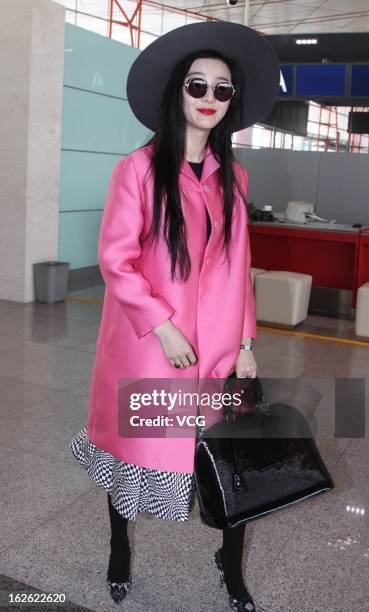 Chinese actress Fan Bingbing arrives at the BeiJing Capital Airport to leave for the 85th Academy Awards 2013 on February 23, 2013 in Beijing, China.