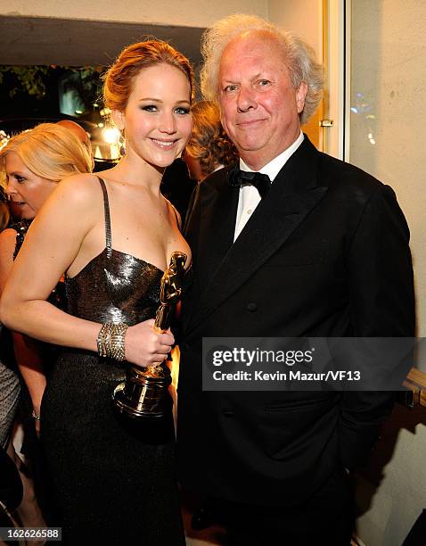 Jennifer Lawrence and Editor-in-chief of Vanity Fair Graydon Carter attends the 2013 Vanity Fair Oscar Party hosted by Graydon Carter at Sunset Tower...