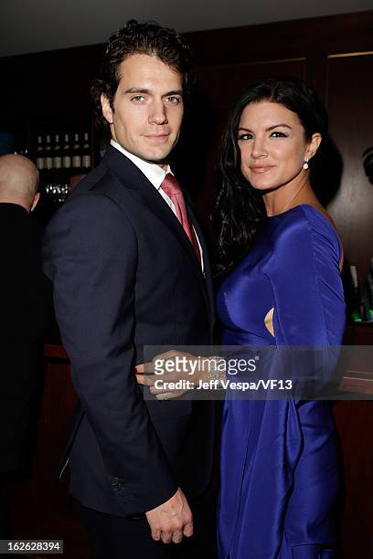 Actors Henry Cavill and Gina Carano attend the 2013 Vanity Fair Oscar Party hosted by Graydon Carter at Sunset Tower on February 24, 2013 in West...