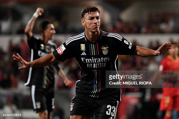 Benfica's Croatian forward Petar Musa celebrates after scoring his team's third goal during the Portuguese league football match between Gil Vicente...