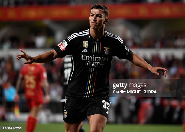 Benfica's Croatian forward Petar Musa celebrates after scoring his team's third goal during the Portuguese league football match between Gil Vicente...