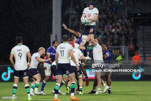 Ireland's lock Ryan Baird catches the ball in a lineout during the pre-World Cup rugby union test match between Ireland and Samoa on August 26, 2023...
