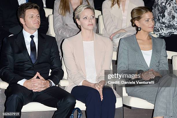 Gareth Wittstock, Princess Charlene of Monaco and Tatiana Blatnik attend the Giorgio Armani fashion show during Milan Fashion Week Womenswear...