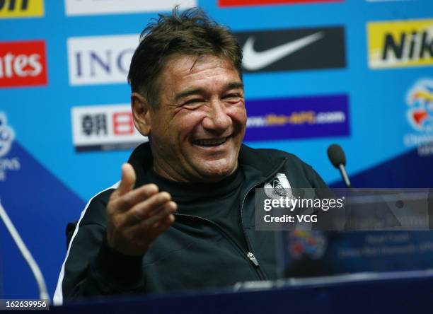 Mihailo Petrovic, coach of Urawa Red Diamonds, smiles during a press conference ahead of the AFC Champions League match between Guangzhou Evergrande...