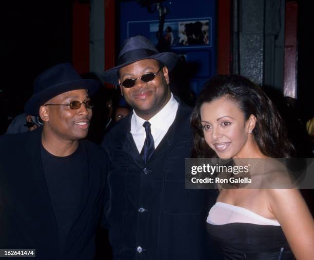 Producers Terrence Lewis and Jimmy Jam and wife Lisa Padilla attend "How Stella Got Her Groove Back" on August 3, 1998 at Mann Chinese Theater in...