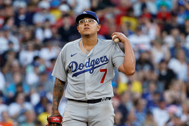 Pitcher Julio Urias of the Los Angeles Dodgers stands on the mound after giving up a three-run home run to the Boston Red Sox during the sixth inning...