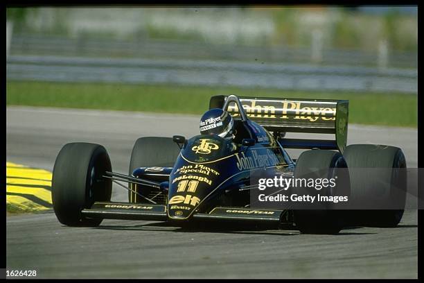 Racing driver Johnny Bute, Marquess of Bute aka Johnny Crichton-Stuart and Johnny Dumfries drives the John Player Special Lotus-Renault 98T turbo...