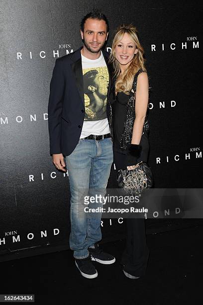 Gianluca Pazzini and Silvia Slitti attend the John Richmond fashion show as part of Milan Fashion Week Womenswear Fall/Winter 2013/14 on February 25,...