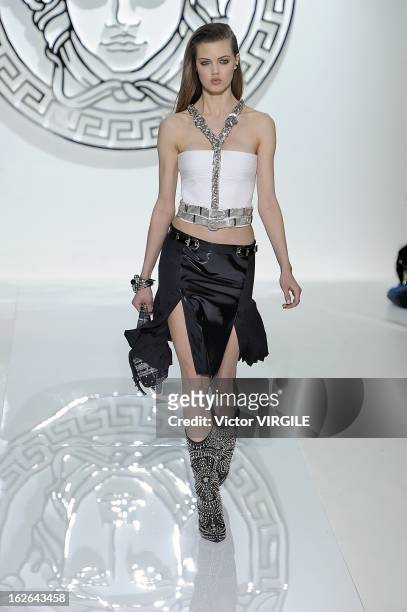 Lindsey Wixson walks the runway at the Versace Ready to Wear Fall/Winter 2013-2014 fashion show during Milan Fashion Week Womenswear Fall/Winter...