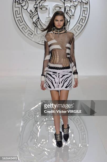 Model walks the runway at the Versace Ready to Wear Fall/Winter 2013-2014 fashion show during Milan Fashion Week Womenswear Fall/Winter 2013/14 on...