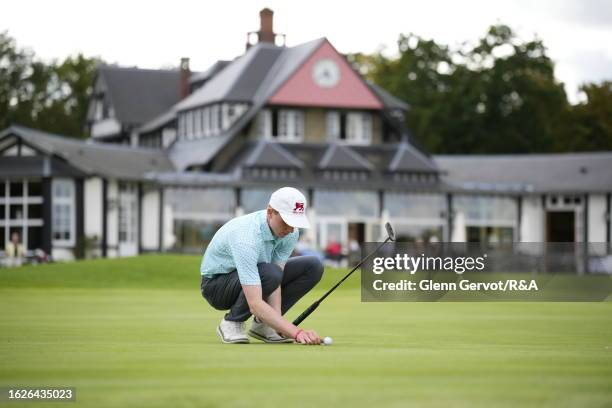 Team Great Britain and Ireland player Donnacha Cleary checks his ball prior to putt on Day Two of the The Jacques Leglise Trophy at Golf de Chantilly...