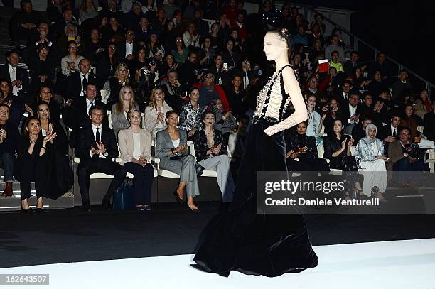 Gareth Wittstock, Princess Charlene of Monaco, Solene Hebert, Margareth Made, Wissam al Mana and Janet Jackson attend the Giorgio Armani fashion show...