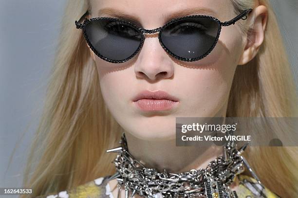 Model walks the runway at the Versace Ready to Wear Fall/Winter 2013-2014 fashion show during Milan Fashion Week Womenswear Fall/Winter 2013/14 on...