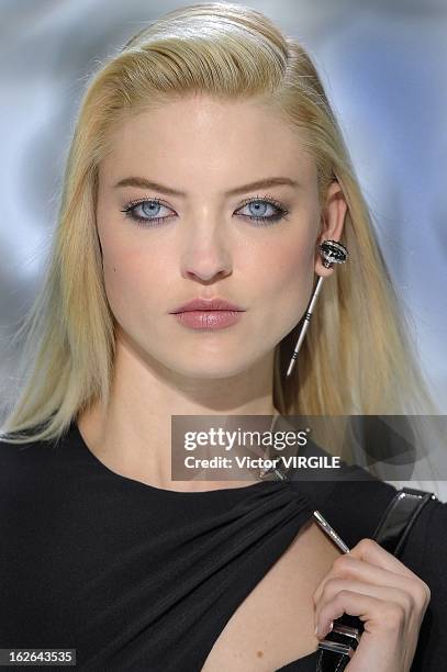 Model walks the runway at the Versace Ready to Wear Fall/Winter 2013-2014 fashion show during Milan Fashion Week Womenswear Fall/Winter 2013/14 on...