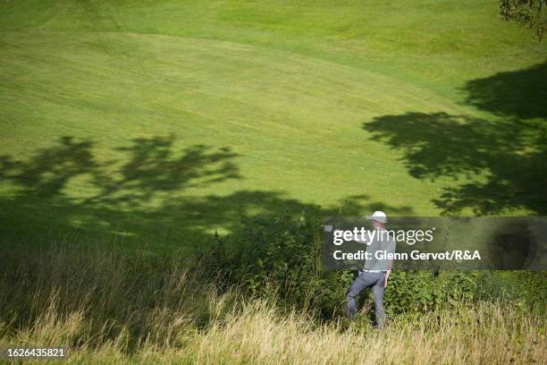 Team Great Britain and Ireland player Donnacha Cleary is searching for his ball after his second shot on the 13th hole on Day Two of the The Jacques...