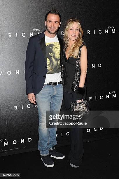 Gianluca Pazzini and Silvia Slitti attend the John Richmond fashion show as part of Milan Fashion Week Womenswear Fall/Winter 2013/14 on February 25,...
