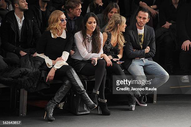 Milly Carlucci, Silvia Slitti and Giampaolo Pazzini attend the John Richmond fashion show as part of Milan Fashion Week Womenswear Fall/Winter...